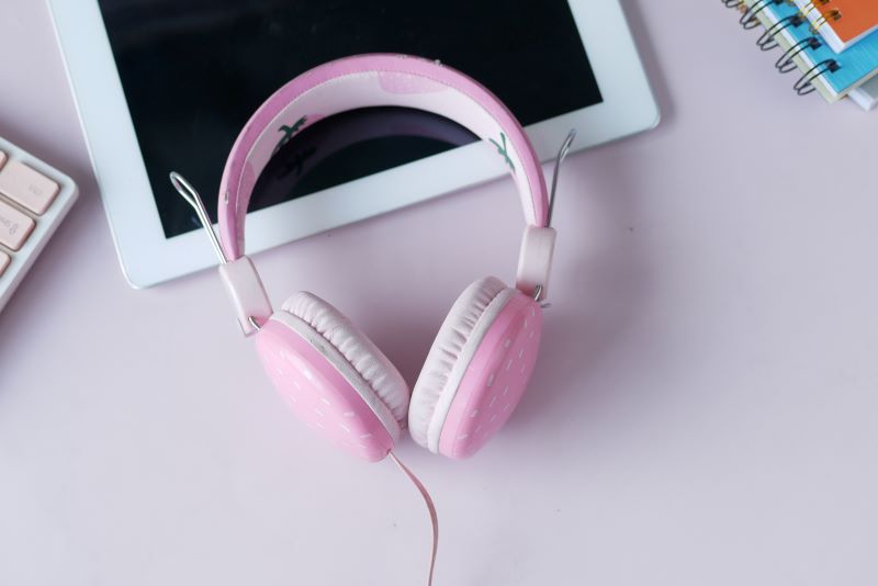 audio-book-concept-headphones-and-digital-tablet-2022-11-24-16-13-51-utc